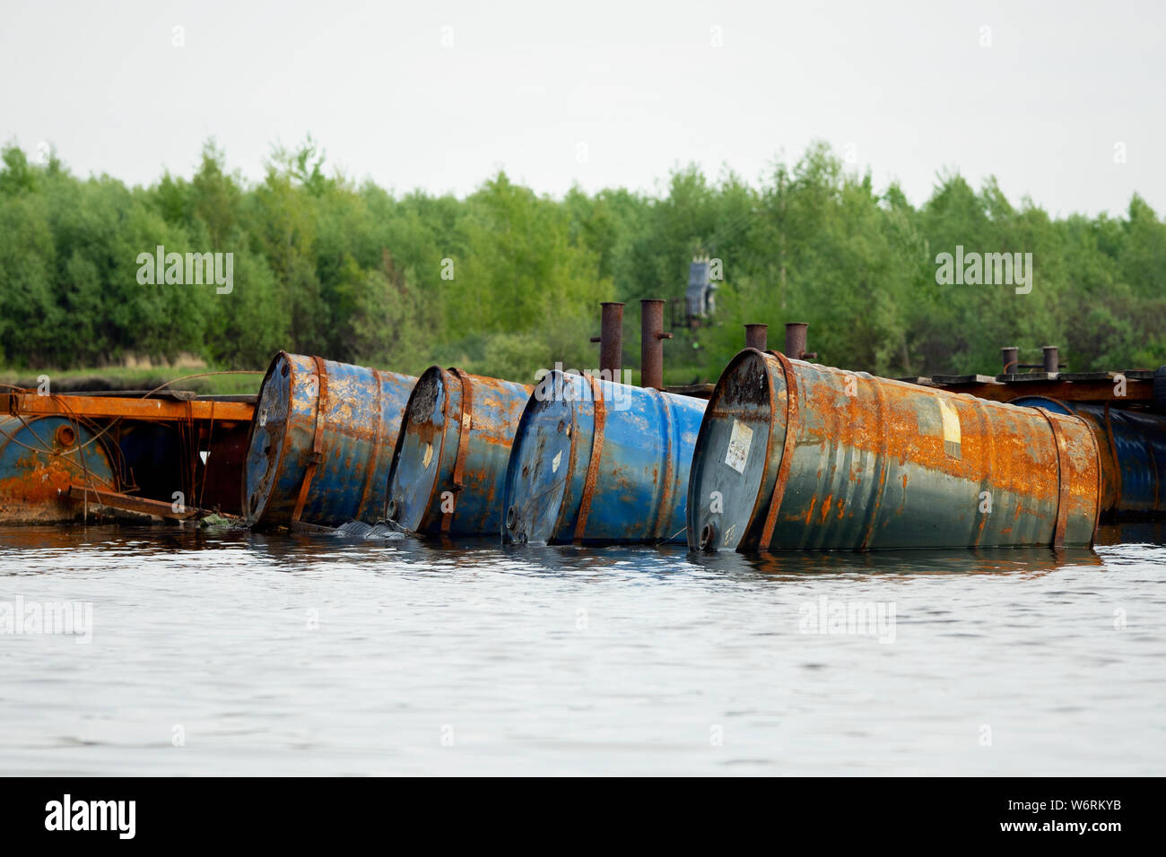 dumped oil drums cause pollution in the water, more and more the water
