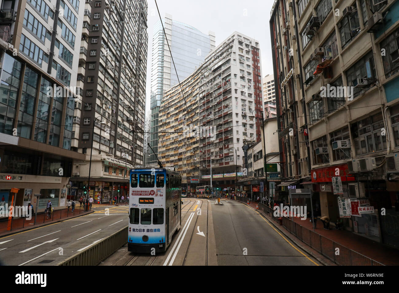 Street view of King's Road from upper deck of double-decker tram in North Point, Hong Kong Stock Photo