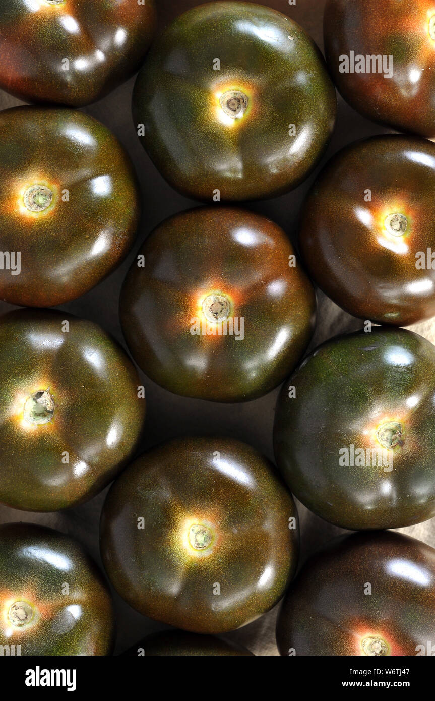 top view of a group of brown tomatoes for background uses Stock Photo ...