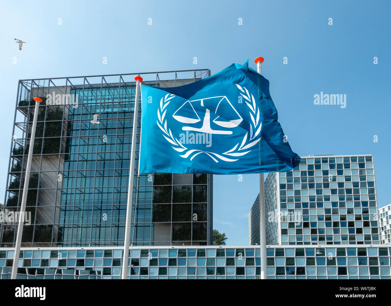 The Hague International Criminal Court buildings in The Hague The Netherlands - ICC Den Haag Nederland. La Cour Pénale Internationale CPI with flag. Stock Photo