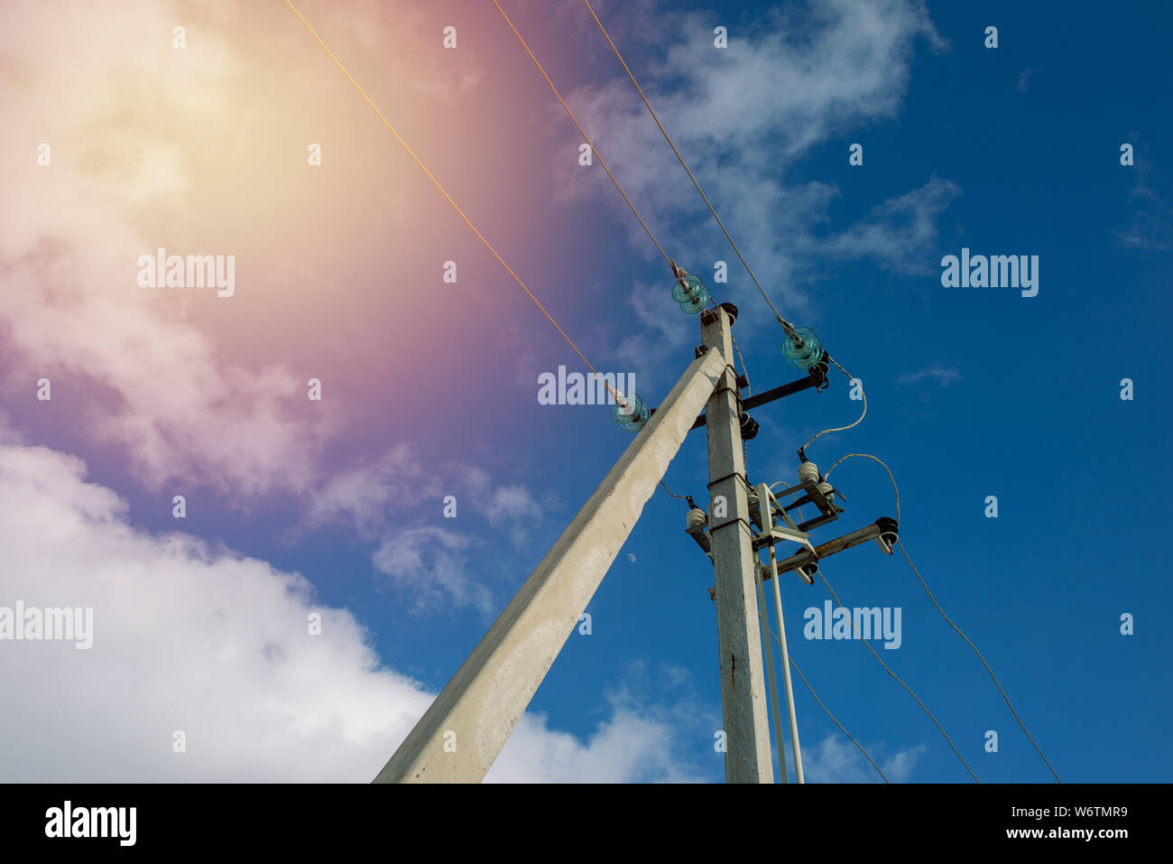 high voltage tower power line for electricity on blue sky with cloudy ...