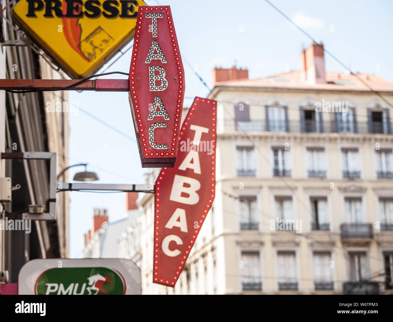 LYON, FRANCE - JULY 14, 2019: French tobacconist sign on a tobaccol seller, selling cigarettes. They are iconic of France, also called buraliste or ma Stock Photo