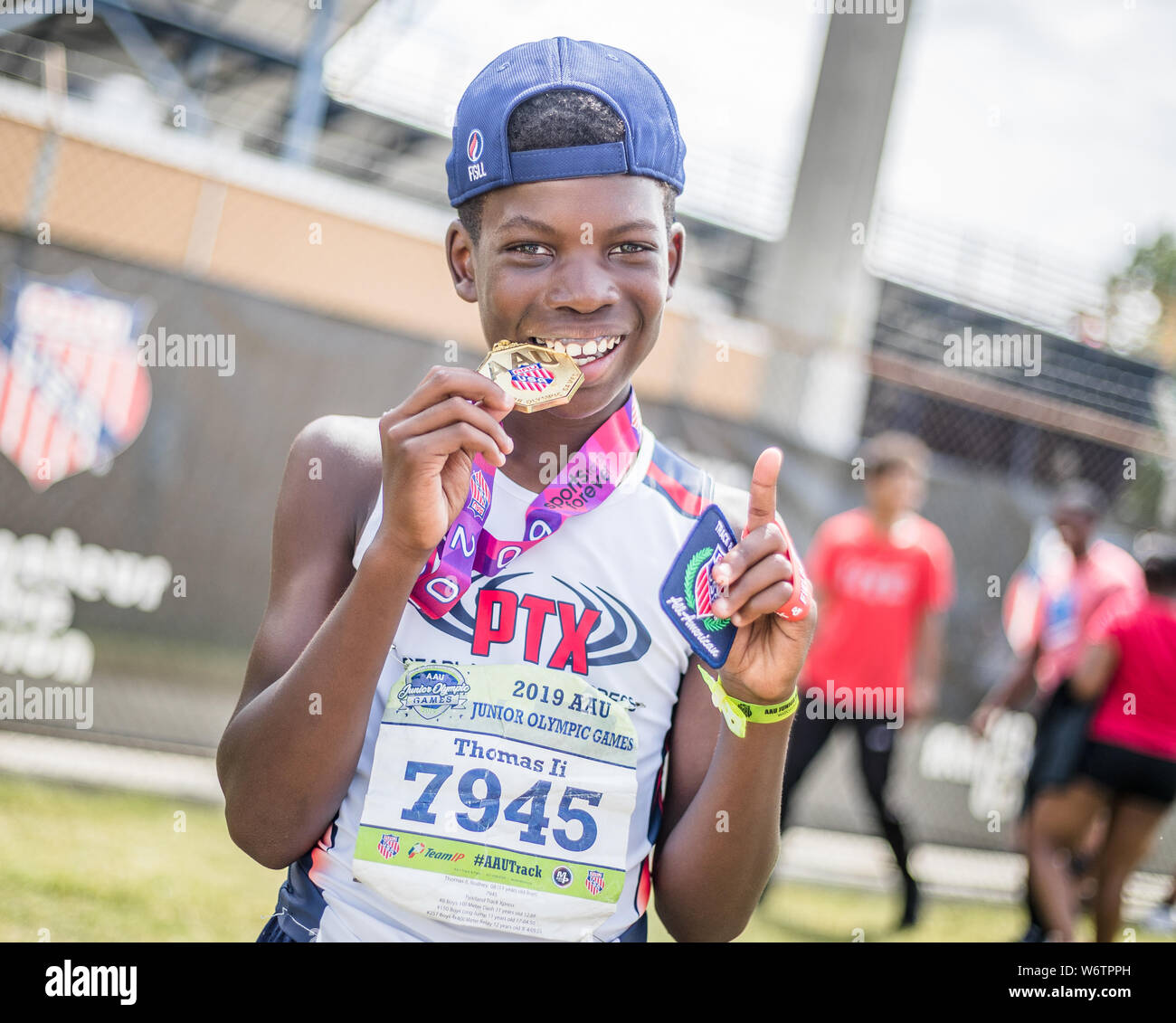 With his gold medal for the junior boys 400m hires stock photography and images Alamy