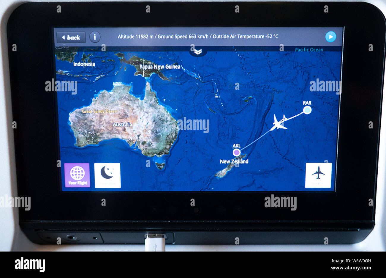 In-flight entertainment screen showing real-time flight information on  board an Air New Zealand flight between Rarotonga and Auckland Stock Photo  - Alamy