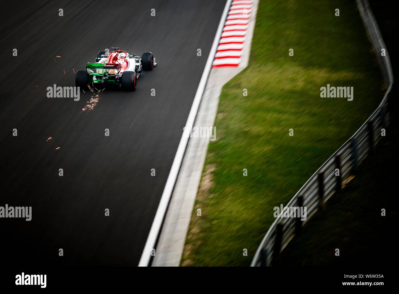 Alfa Romeo Racing's Finnish driver Kimi Raikkonen competes during the first practice session of the Hungarian F1 Grand Prix. Stock Photo