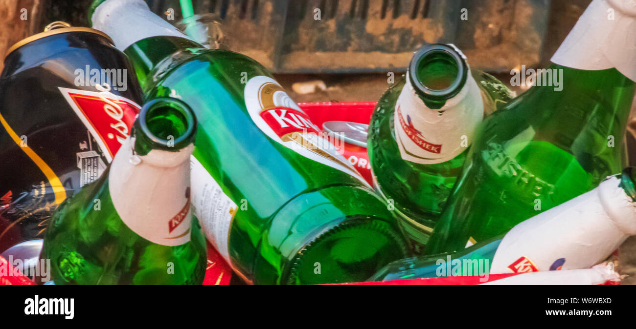 Recyclable garbage of glass and plastic bottles in rubbish bin in Goa