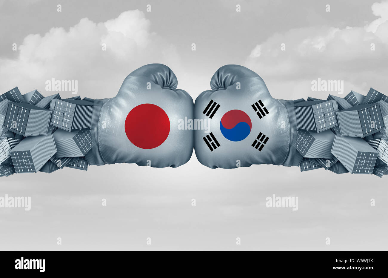 South Korea Japan trade conflict and global trade dispute as two opposing boxing gloves and freight containers in a Japanese and South Korean. Stock Photo