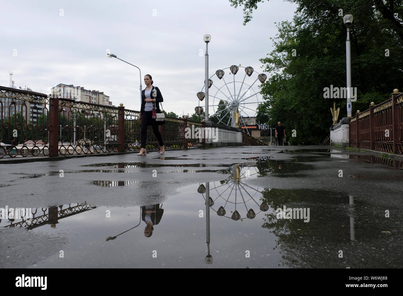 Pedestrian crossing Peshekhodnyy Most Grifonom bridge over Terek river ...