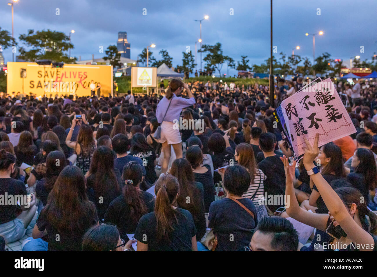 Civil servants of Hong Kong attending the anti government rally with placards.Tens of thousands of civil servants of Hong Kong rallied in the financial district of Hong Kong in an anti government protest to demand the Hong Kong government to listen and answer to the people's demand to fully withdraw the extraditional bill. Stock Photo