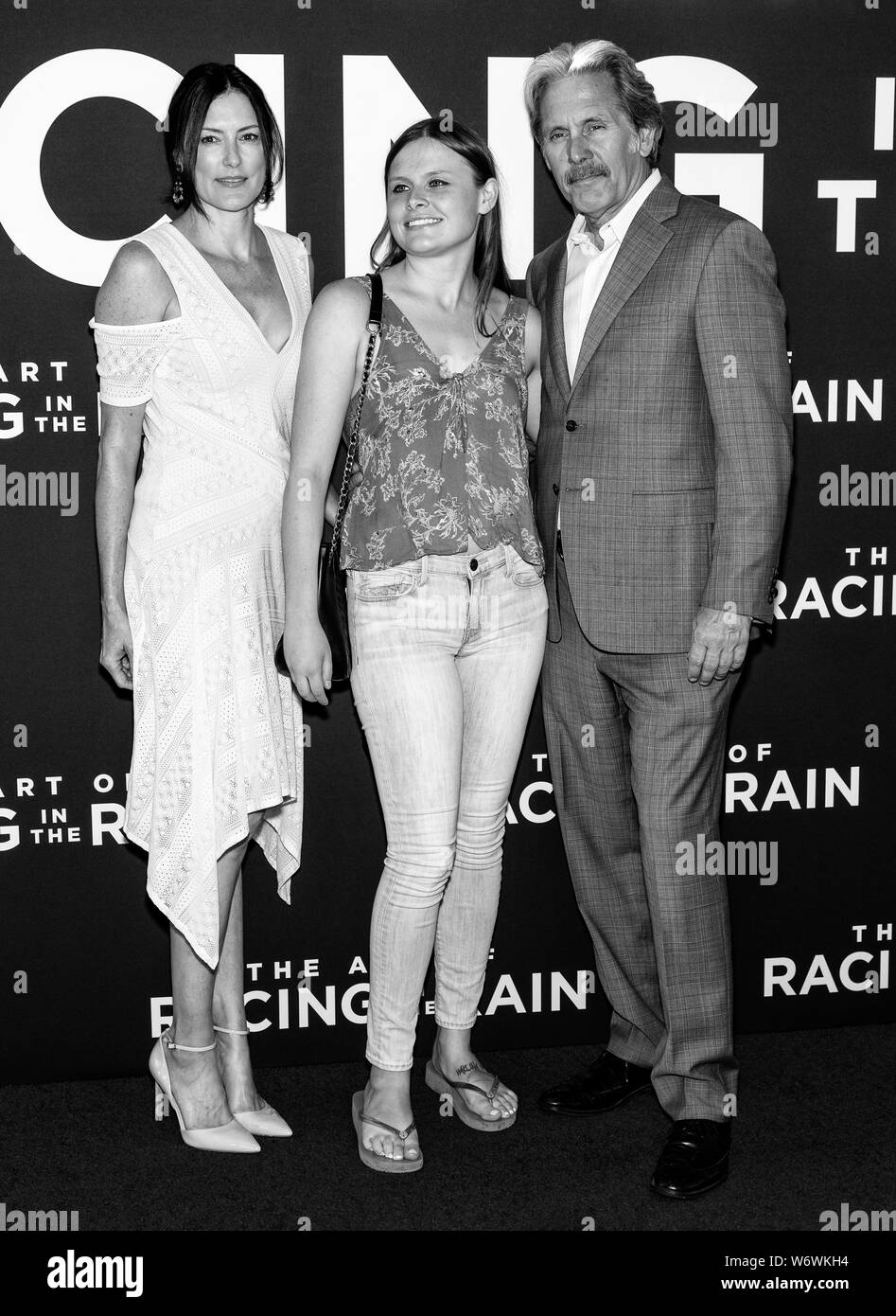 Los Angeles, CA - August 01, 2019: Gary Cole (R) and daughter Mary Cole (C)  attend the premiere Of  "The Art of Racing in the Rain" held at El Capita Stock Photo