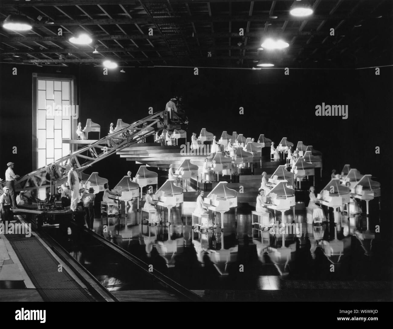 BUSBY BERKELEY directing The Words Are In My Heart production number for GOLD DIGGERS OF 1935 cinematography George Barnes art direction Anton Grot costumes Orry - Kelly First National Pictures / Warner Bros. Stock Photo