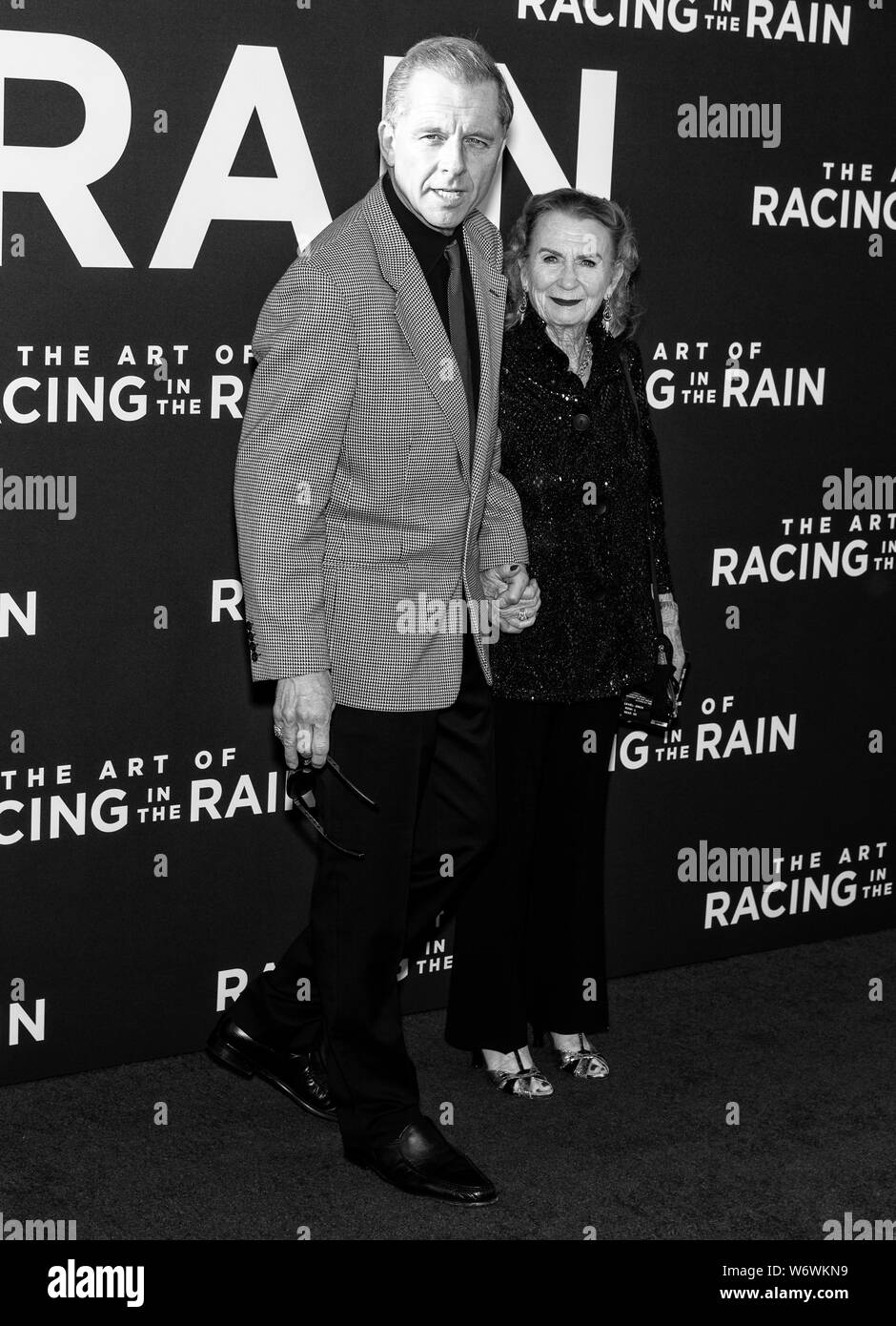 Los Angeles, CA - August 01, 2019: Maxwell Caulfield and Juliet Mills attend the premiere Of  'The Art of Racing in the Rain' held at El Capitan Theat Stock Photo