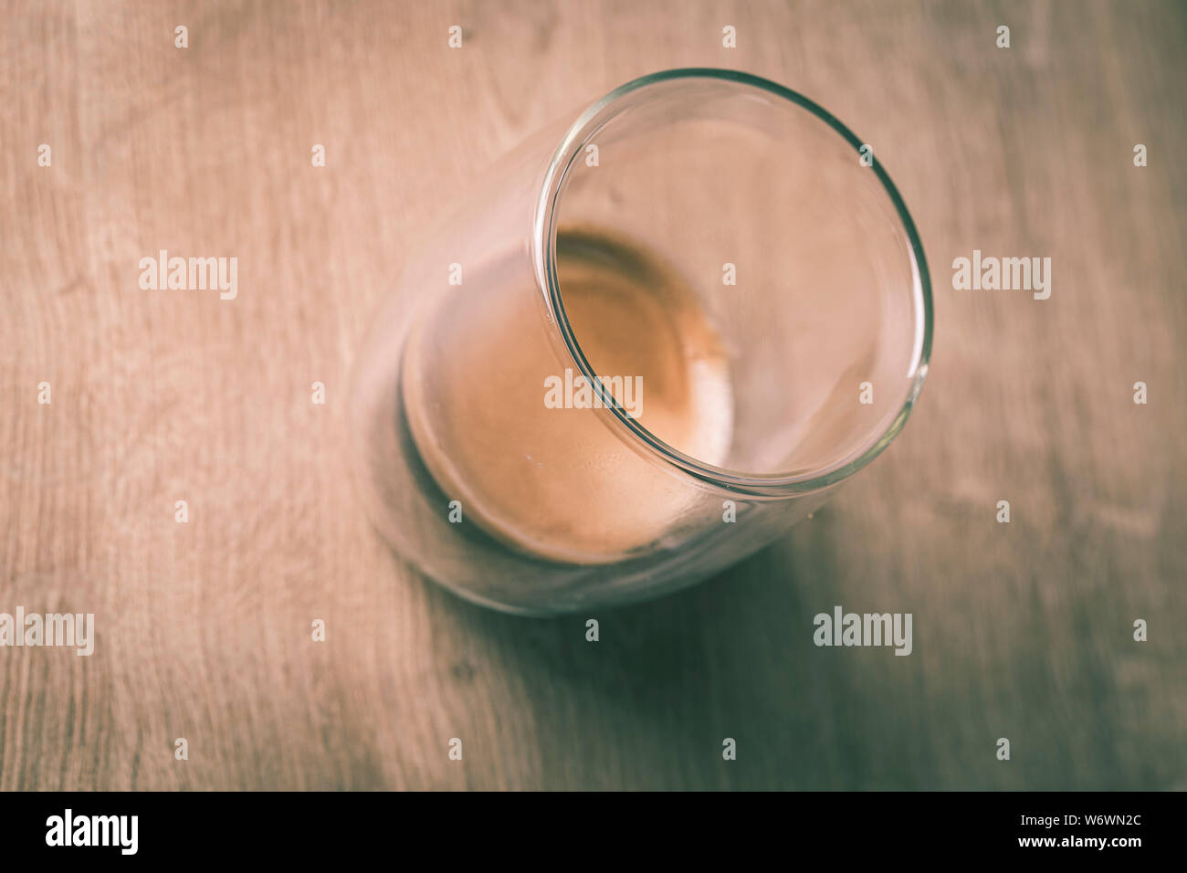 Espresso coffee served on a transparent drinking glass Stock Photo