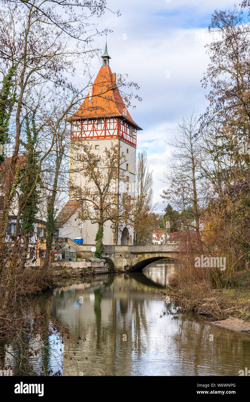 Germany, Waiblingen city gate and bridge reflecting in river rems water Stock Photo
