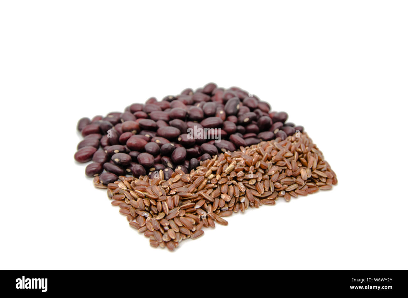 red beans and brown ruby rice on a white background Stock Photo