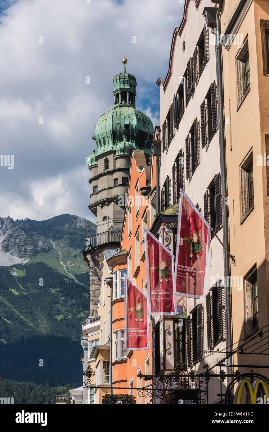 Street scenes in the Alte Stadt part of the old city of Innsbruck, looking towards the Alte Stadt tower Stock Photo