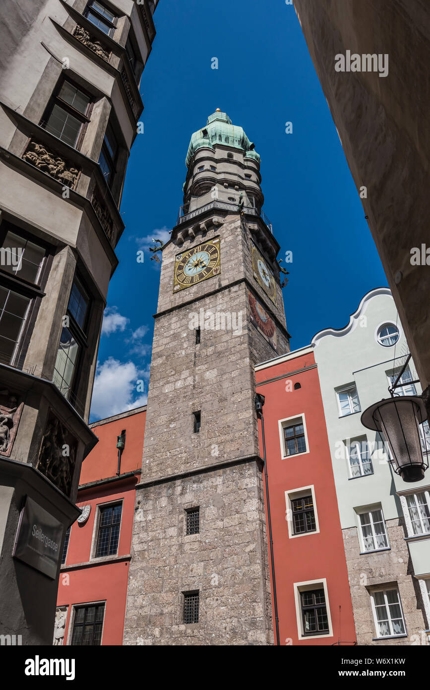Street scenes in the Alte Stadt part of the old city of Innsbruck, looking towards the Alte Stadt tower Stock Photo