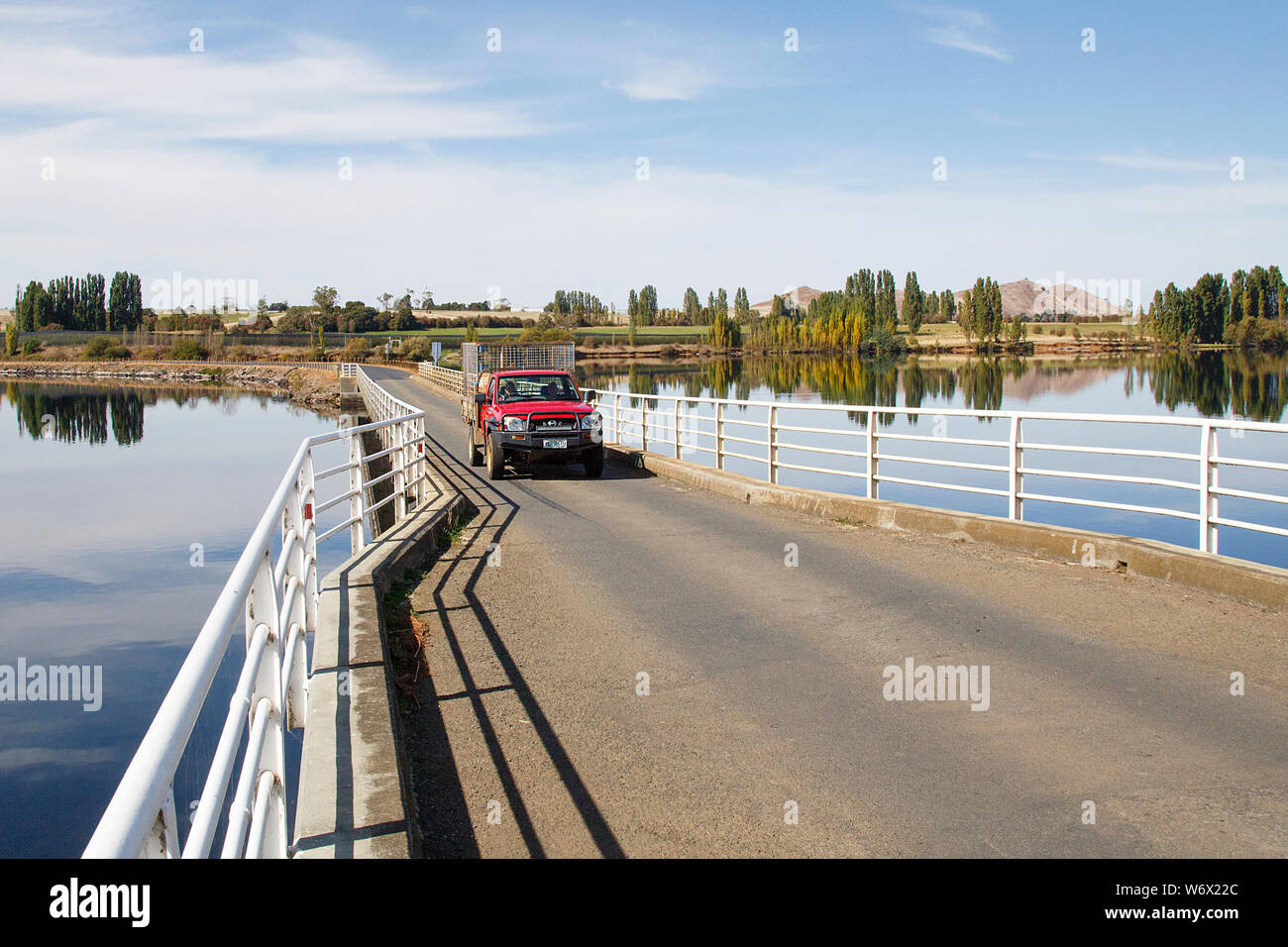Ellendale, Tasmania April, 2019 Pickup truck crossing Lake