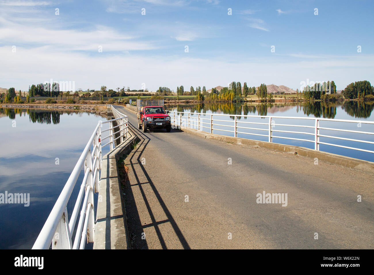 Ellendale, Tasmania April, 2019 Pickup truck crossing Lake