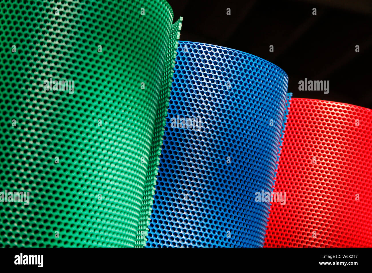 Colorful and perforated plastic grid Stock Photo Alamy