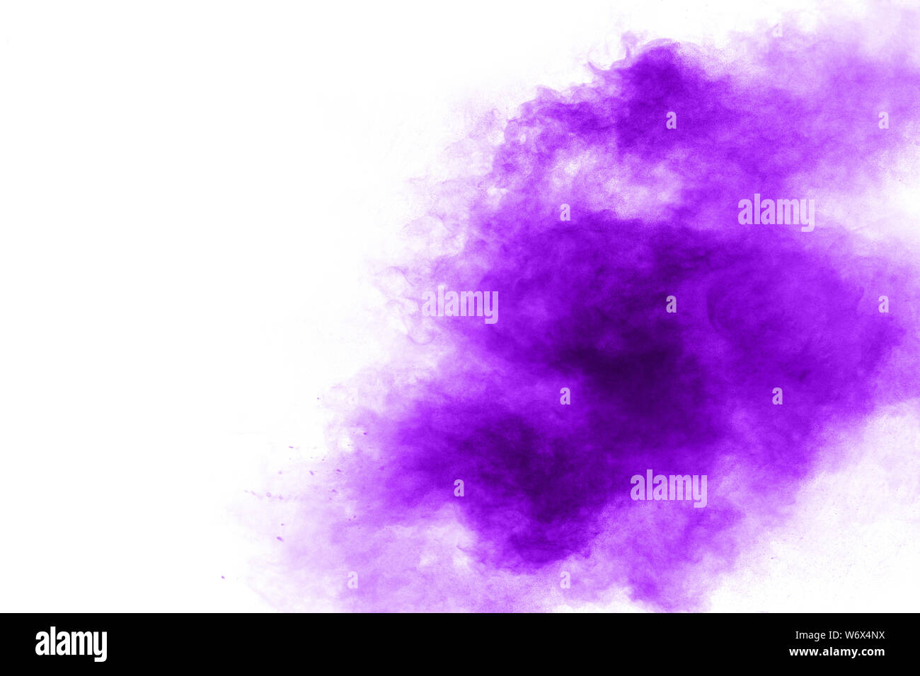 Abstract purple powder explosion on white background, Freeze motion of ...