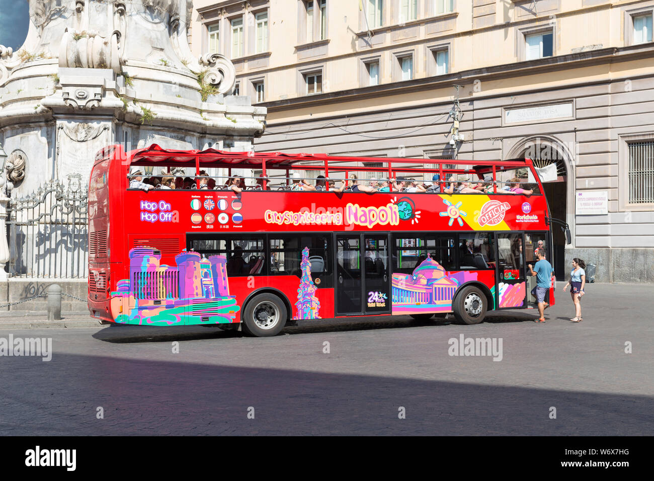 A tourist hop-off hop-on bus in Naples, Italy Stock Photo