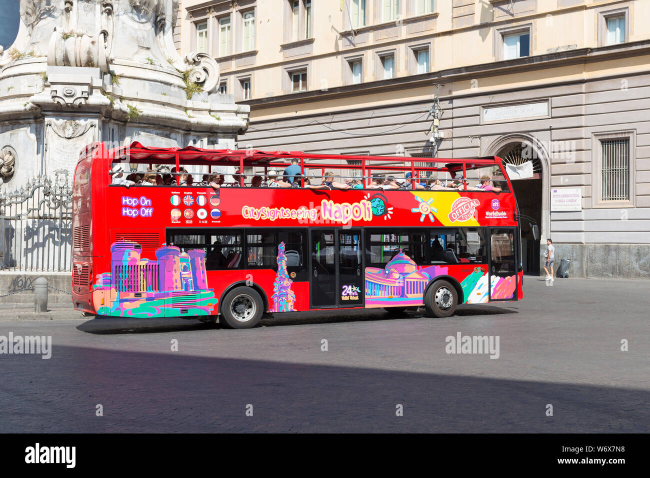 A tourist hop-off hop-on bus in Naples, Italy Stock Photo