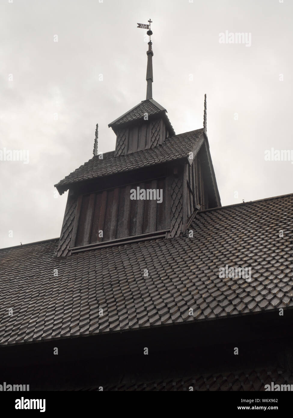 Eidsborg Stave church from the medieval period, a prime example of Norwegian wooden architecture and a tourist attraction, roof and steeple Stock Photo