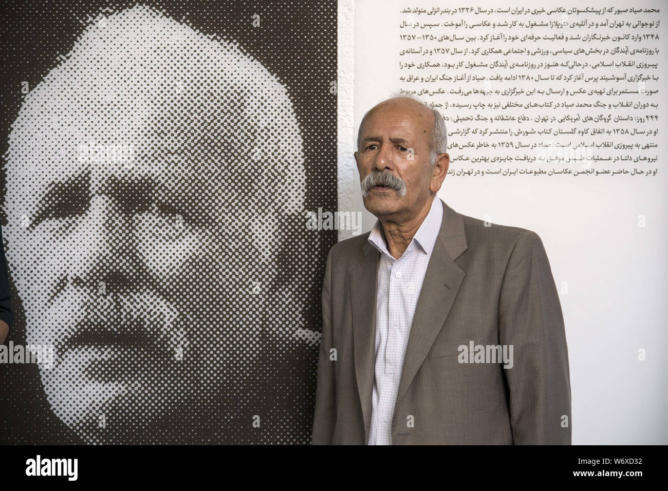 Tehran, Tehran, IRAN. 2nd Aug, 2019. Iranian former AP photographer, Mohammad Sayad posses at the Nabshi Gallery in Tehran, Iran. Credit: Rouzbeh Fouladi/ZUMA Wire/Alamy Live News Stock Photo