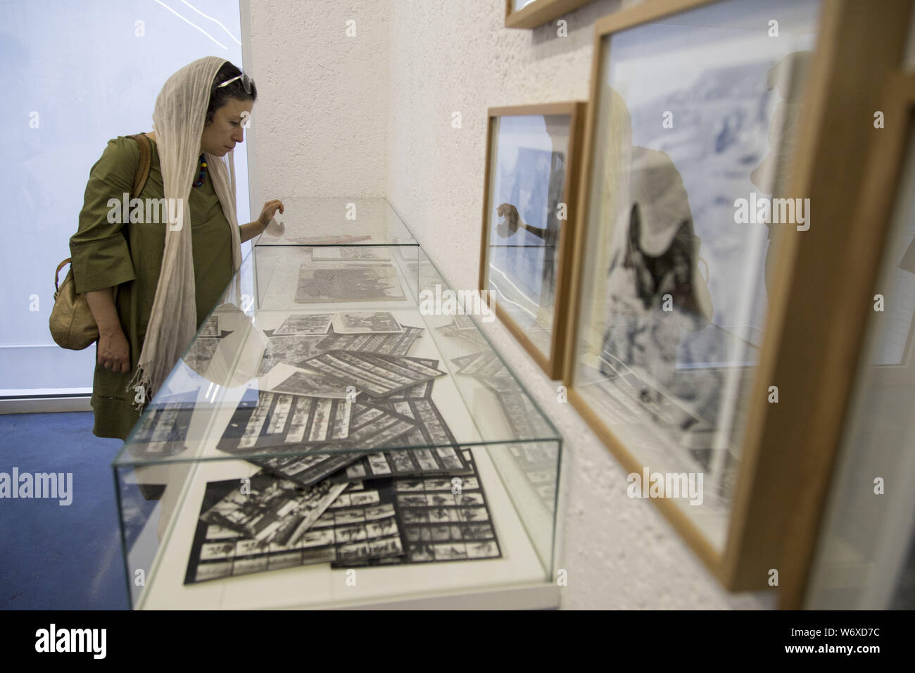 August 2, 2019, Tehran, Tehran, IRAN: People visit Iranian former AP photographer, Mohammad Sayad's exhibit at the Nabshi Gallery in Tehran, Iran. (Credit Image: © Rouzbeh Fouladi/ZUMA Wire) Stock Photo