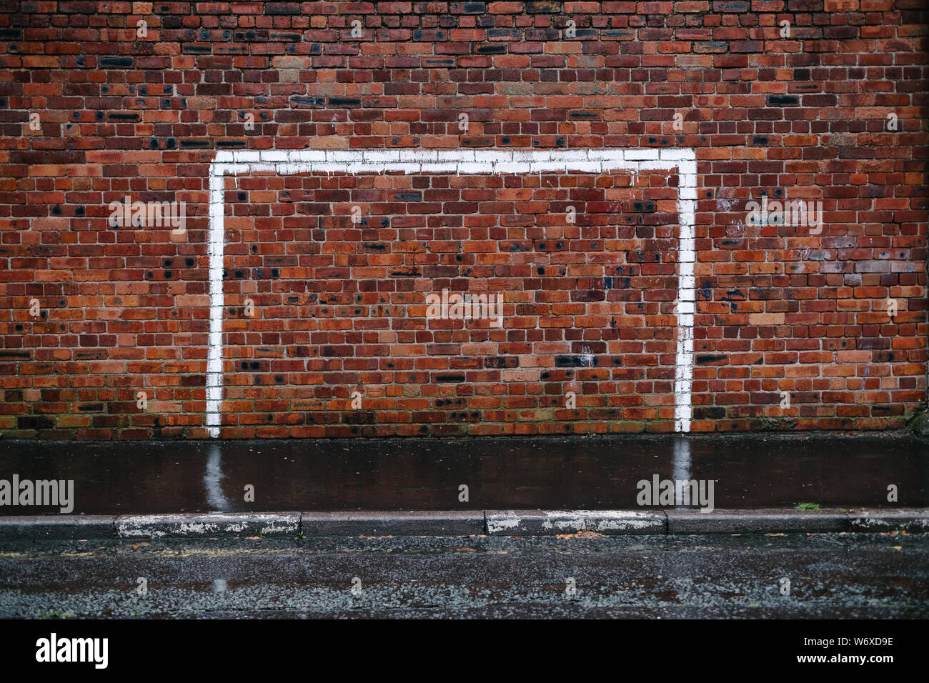 Goal posts painted on a wall in Liverpool, England. Stock Photo