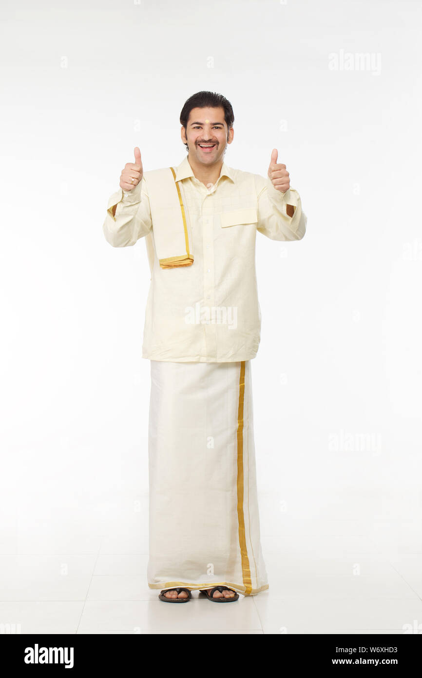 South indian man standing thumbs hi-res stock photography and images ...