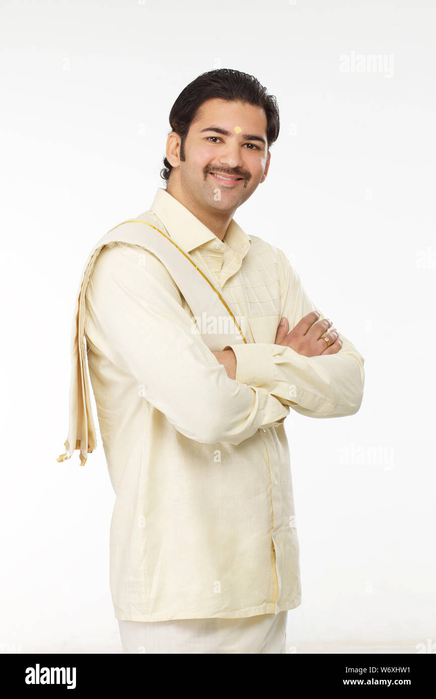 South Indian man standing with his arms crossed Stock Photo Alamy