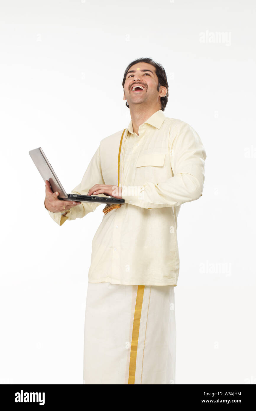 South indian man laughing hi-res stock photography and images - Alamy