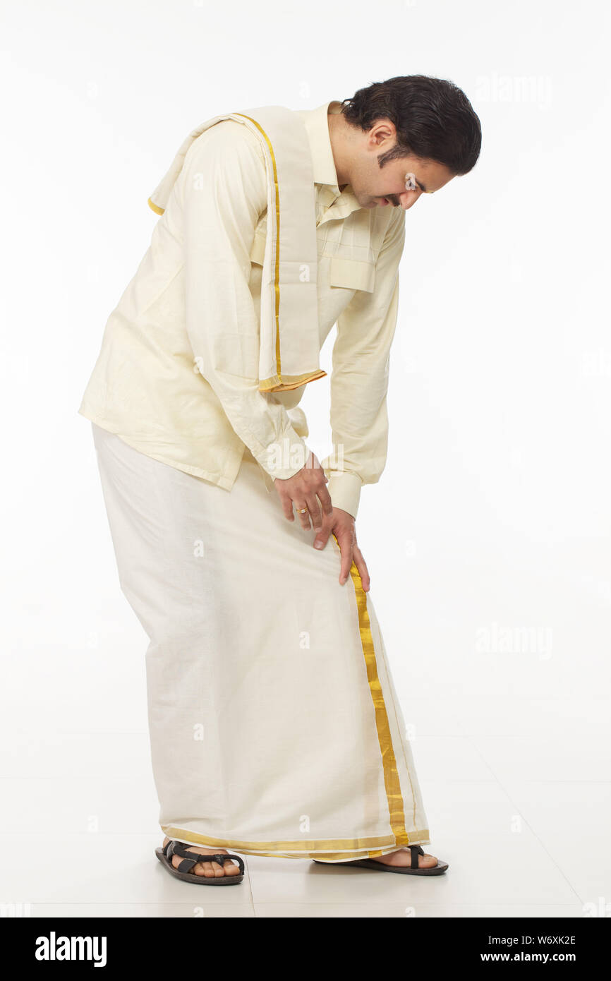 South Indian man suffering from knee pain Stock Photo - Alamy
