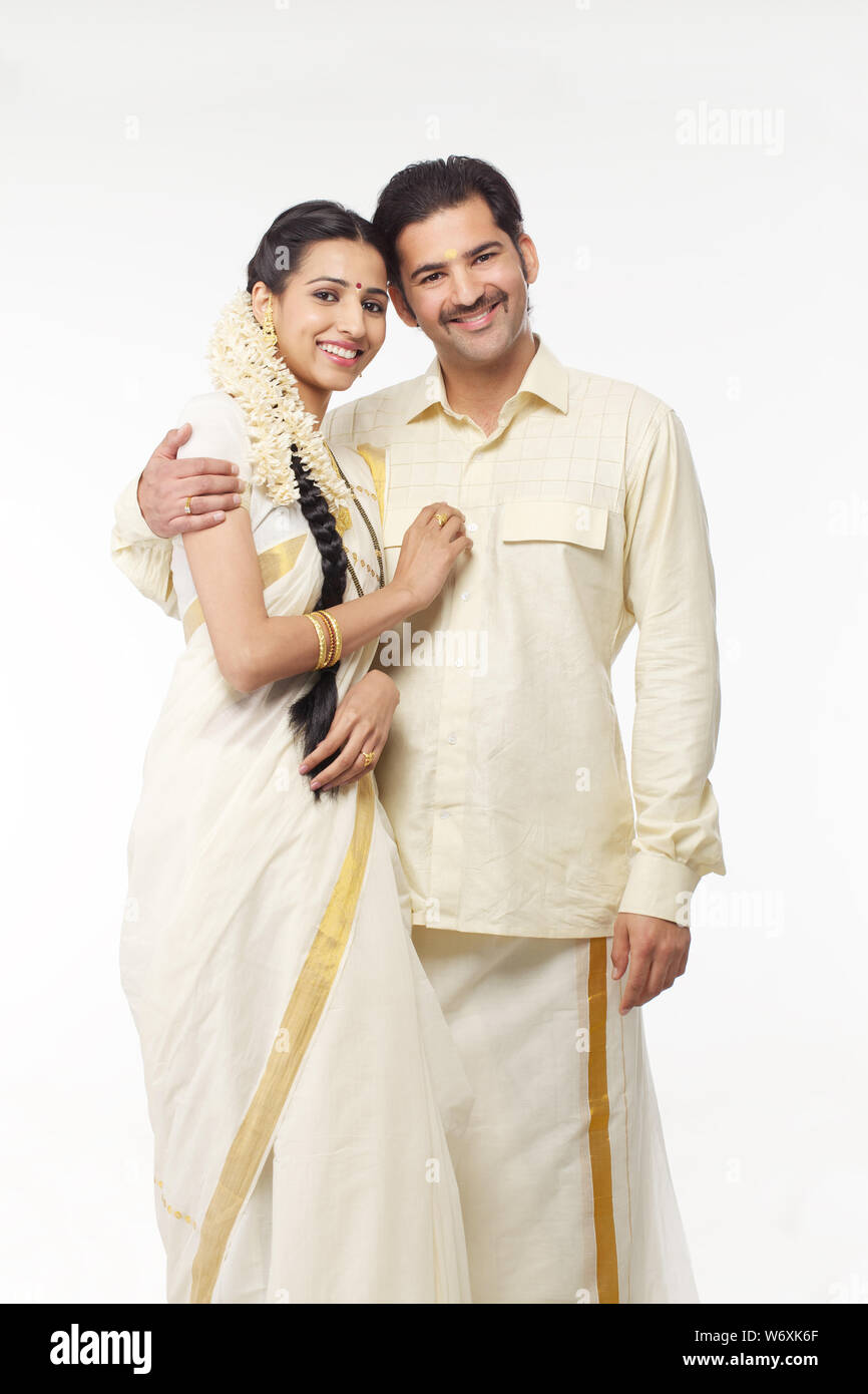 South Indian couple standing together Stock Photo - Alamy