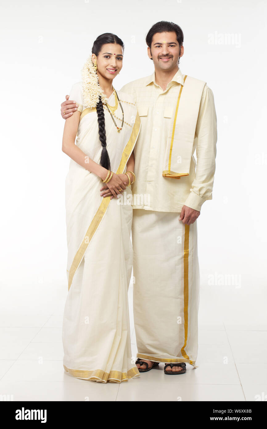 South Indian couple standing together Stock Photo - Alamy