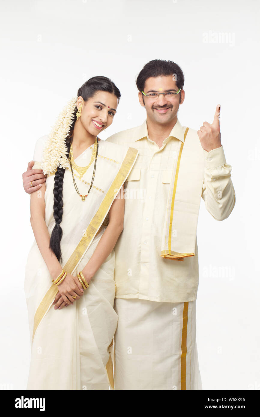 South Indian couple standing together Stock Photo - Alamy