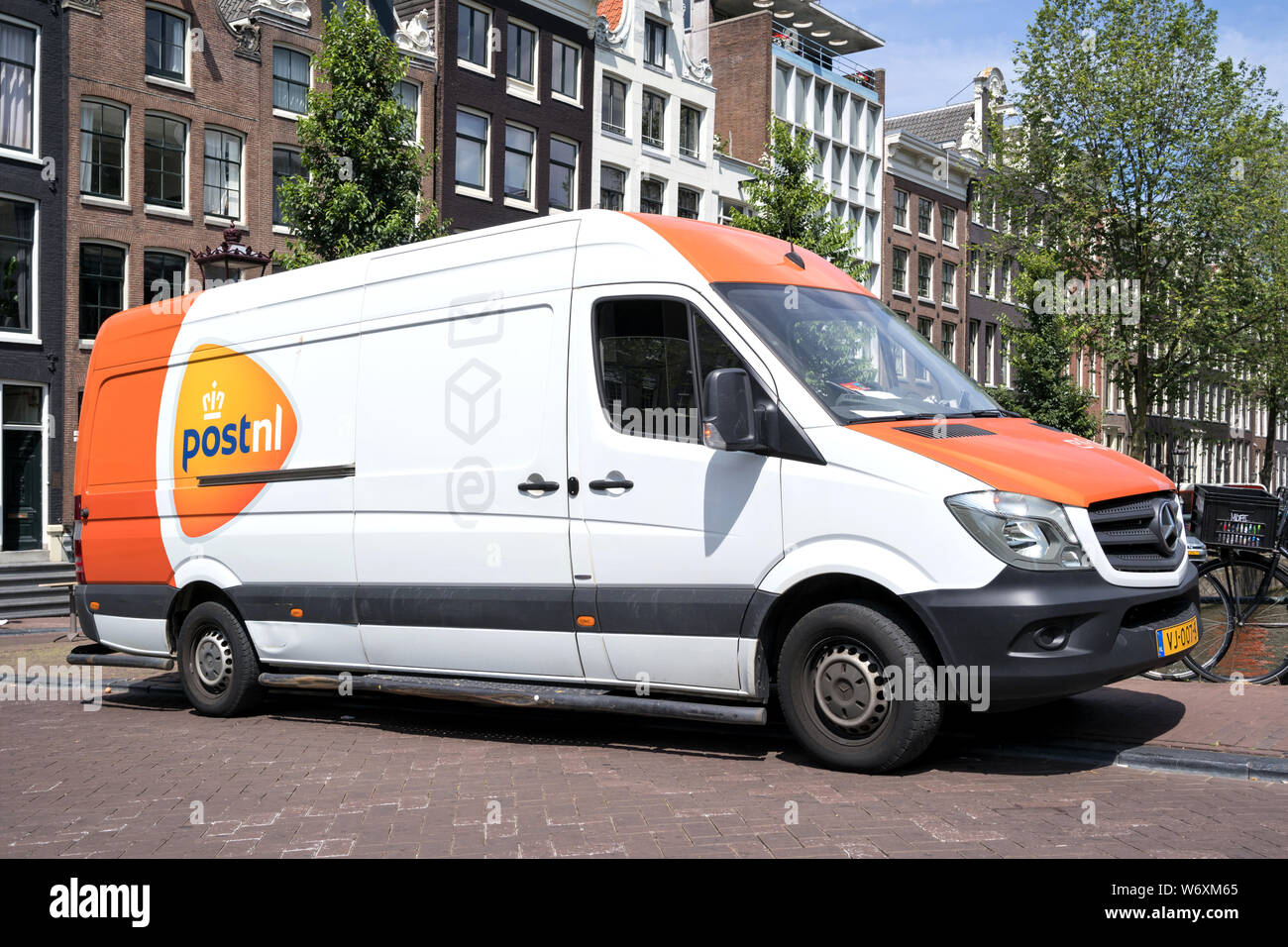 PostNL delivery van. PostNL is a mail, parcel and e-commerce corporation with operations in the Netherlands, Germany, Italy, Belgium, and the U. Stock Photo