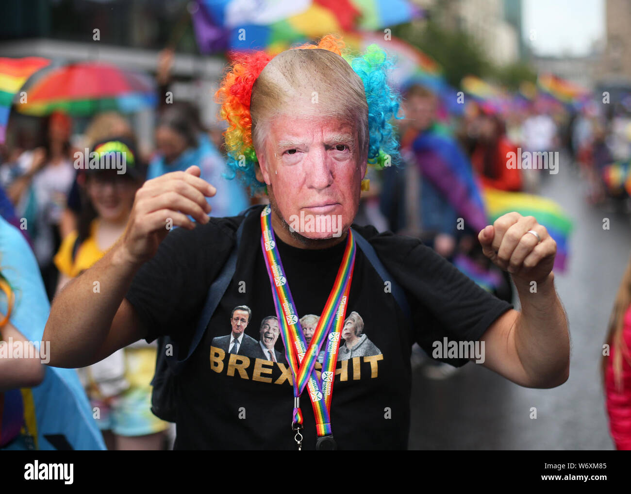 A person wearing a Donald Trump mask during the Belfast Pride parade. Stock Photo