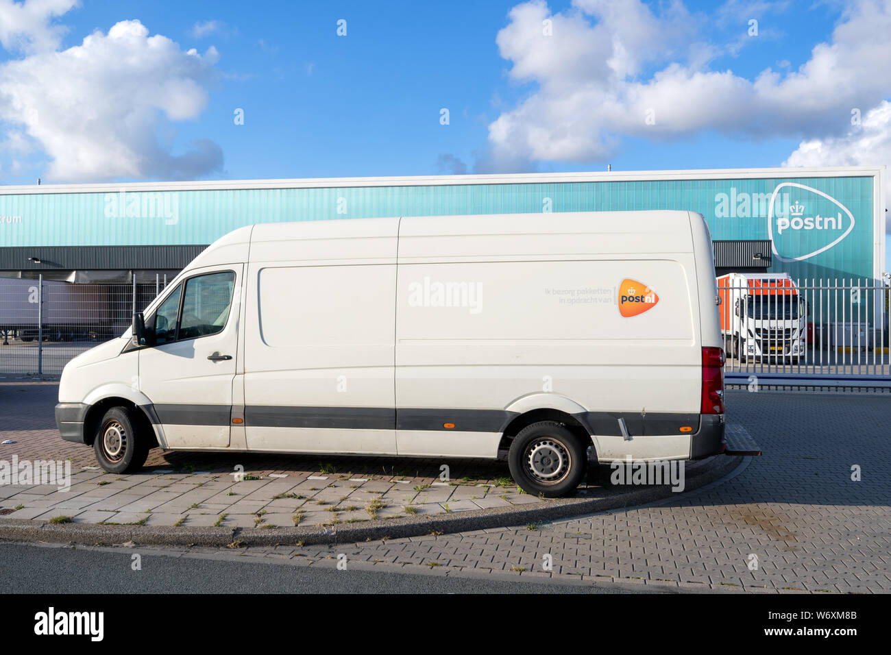 PostNL delivery van. PostNL is a mail, parcel and e-commerce corporation with operations in the Netherlands, Germany, Italy, Belgium, and the UK. Stock Photo