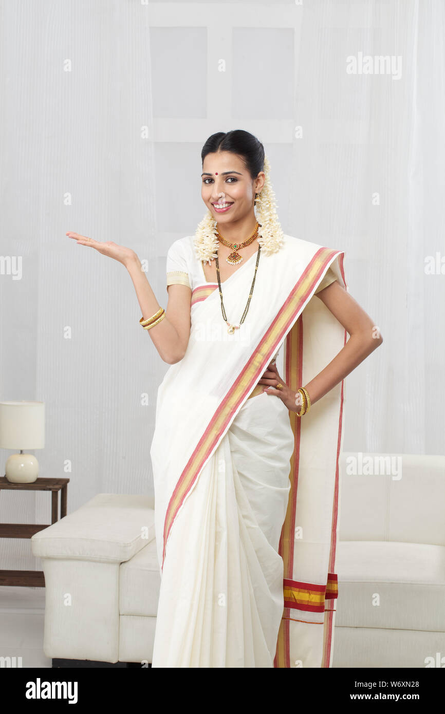 South Indian woman standing and gesturing Stock Photo - Alamy