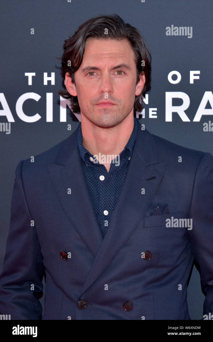 HOLLYWOOD, CA - AUGUST 01: Milo Ventimiglia arrives for the Premiere Of 20th Century Fox's "The Art Of Racing In The Rain" held at El Capitan Theatre Stock Photo
