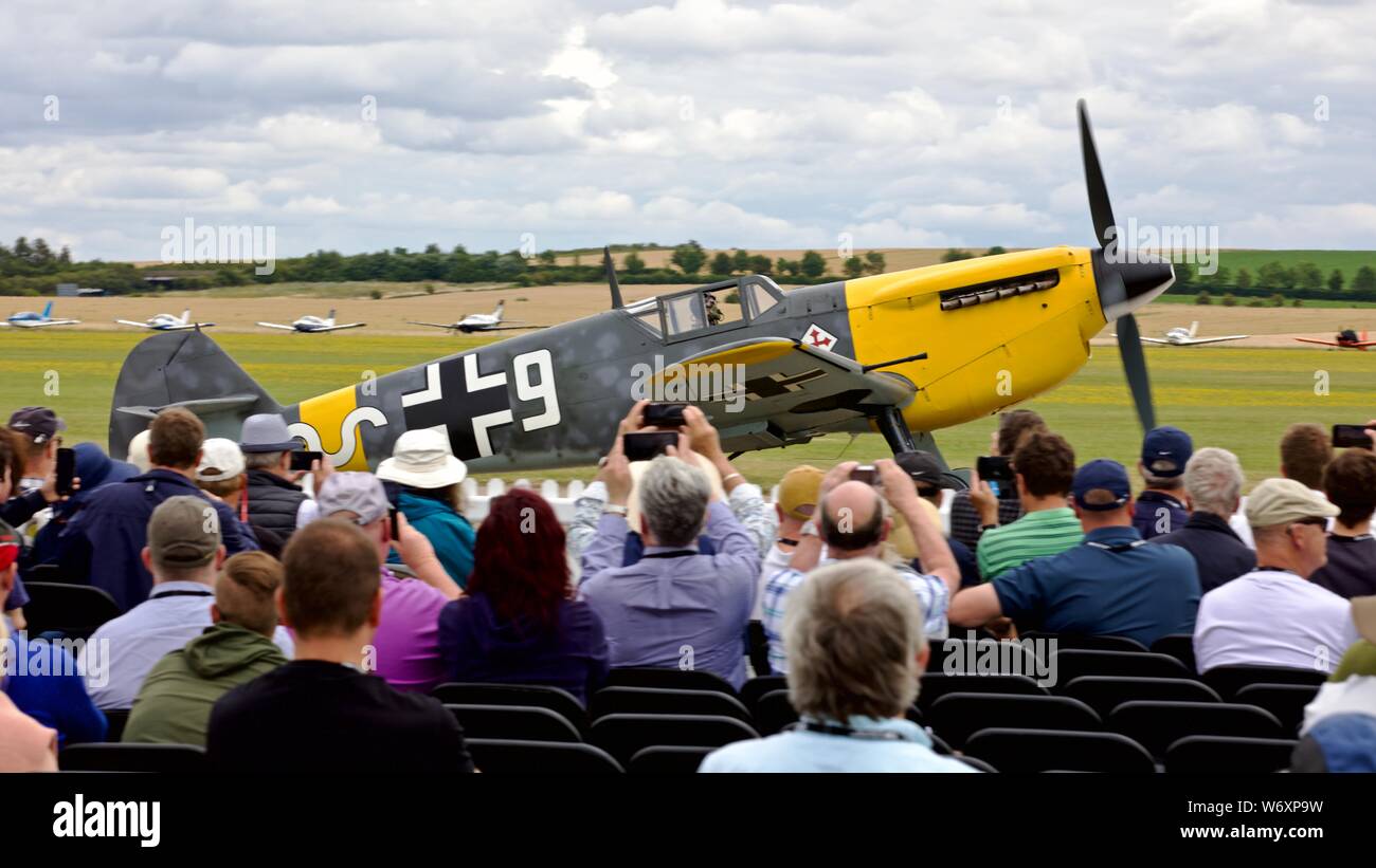 Hispano Aviación HA-1112 taxiing past spectators at the 2019 Flying Legends Airshow Stock Photo