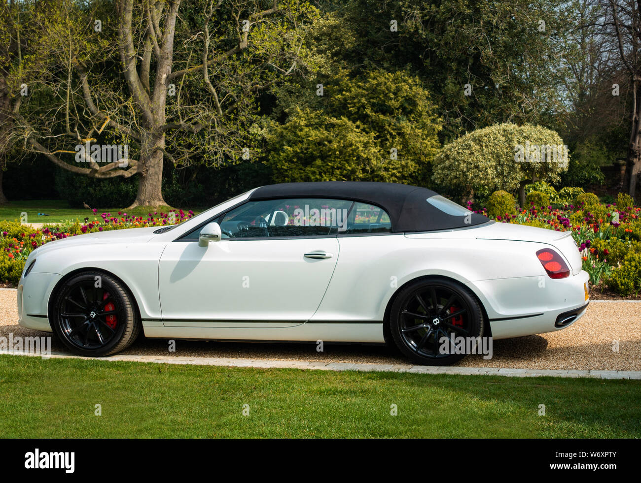 White Bentley Continental GTC Supersport with black Soft Top Stock Photo -  Alamy