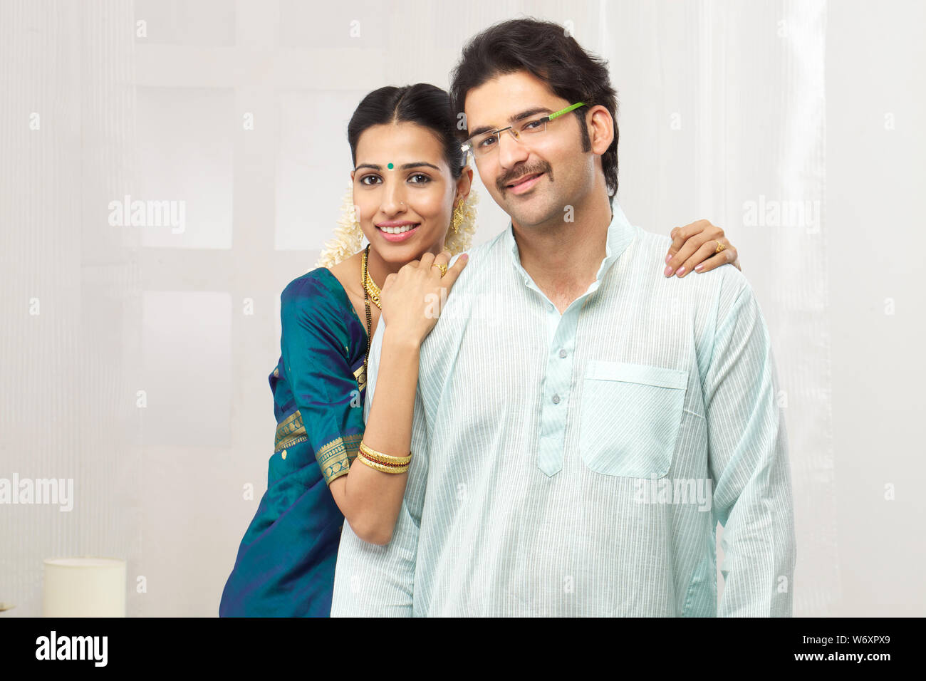 South Indian couple standing together Stock Photo - Alamy