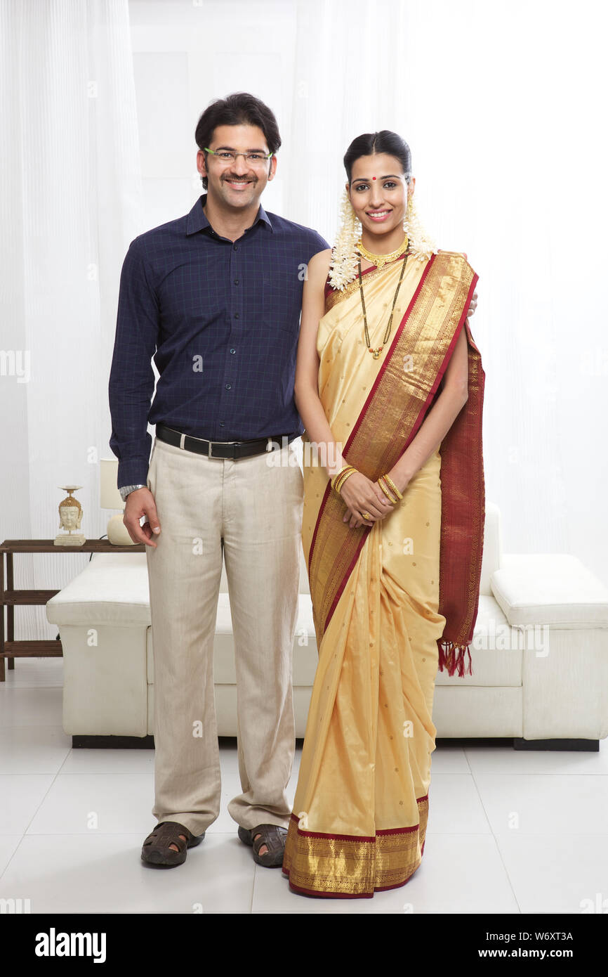 South Indian couple standing together Stock Photo - Alamy