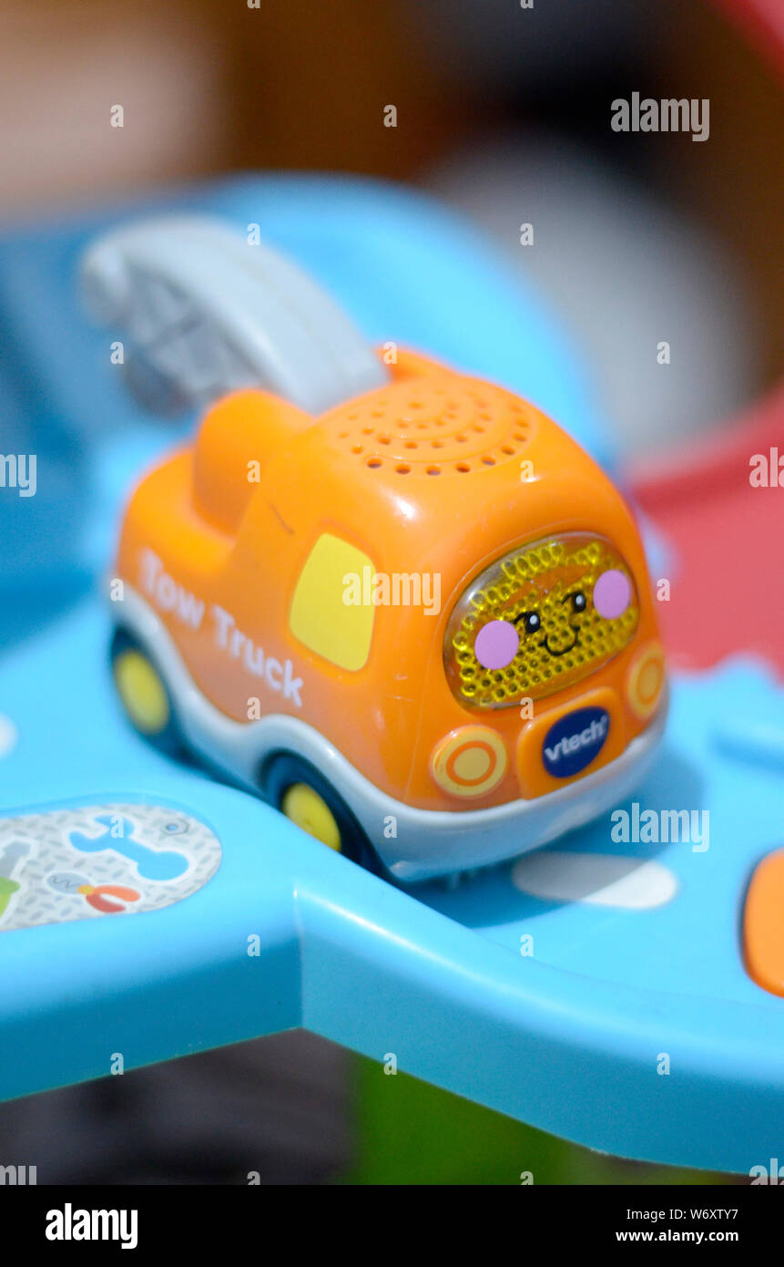 green tow truck toy