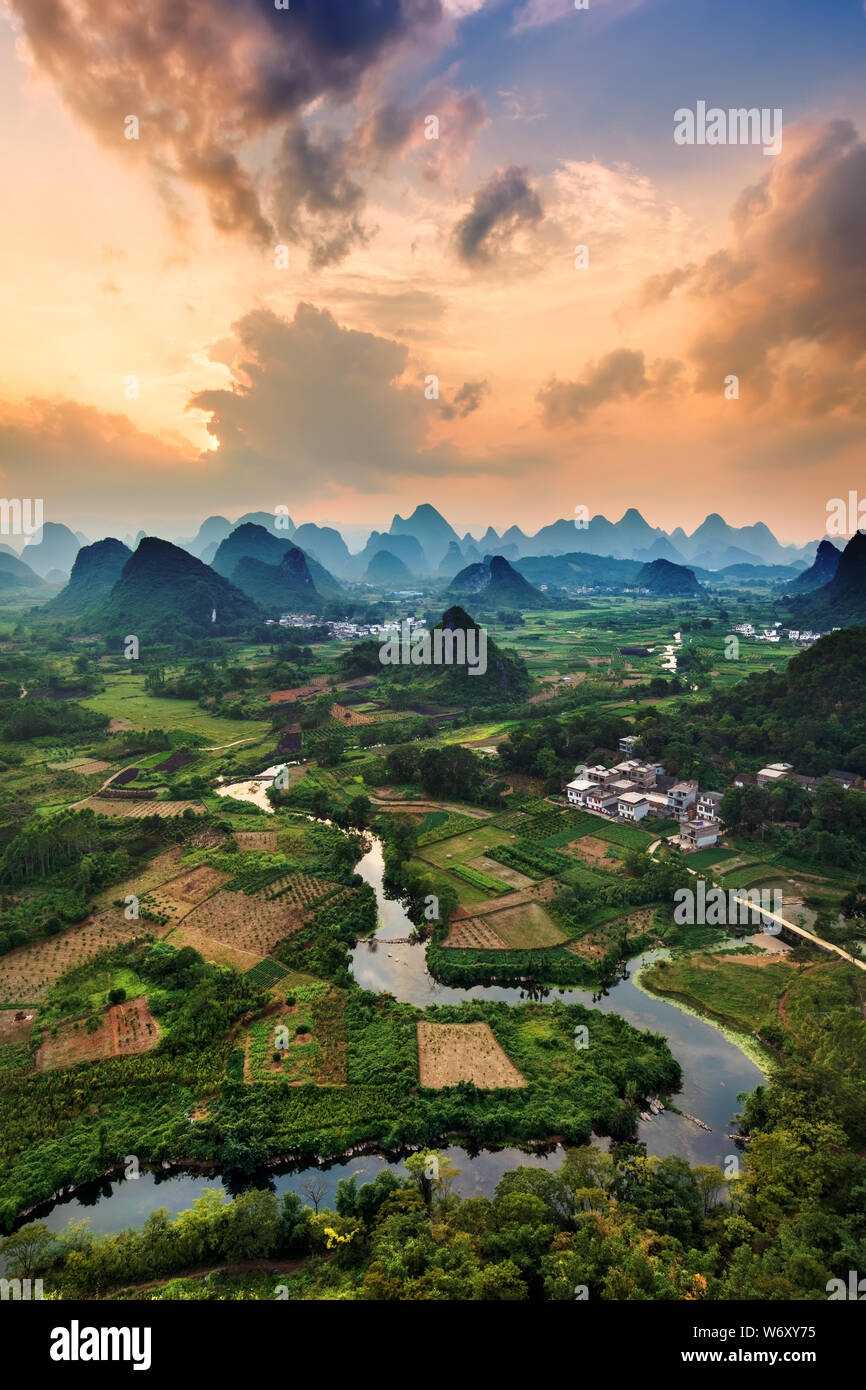 Landscape of Karst Mountains and Li River at sunset, Guilin, China Stock Photo