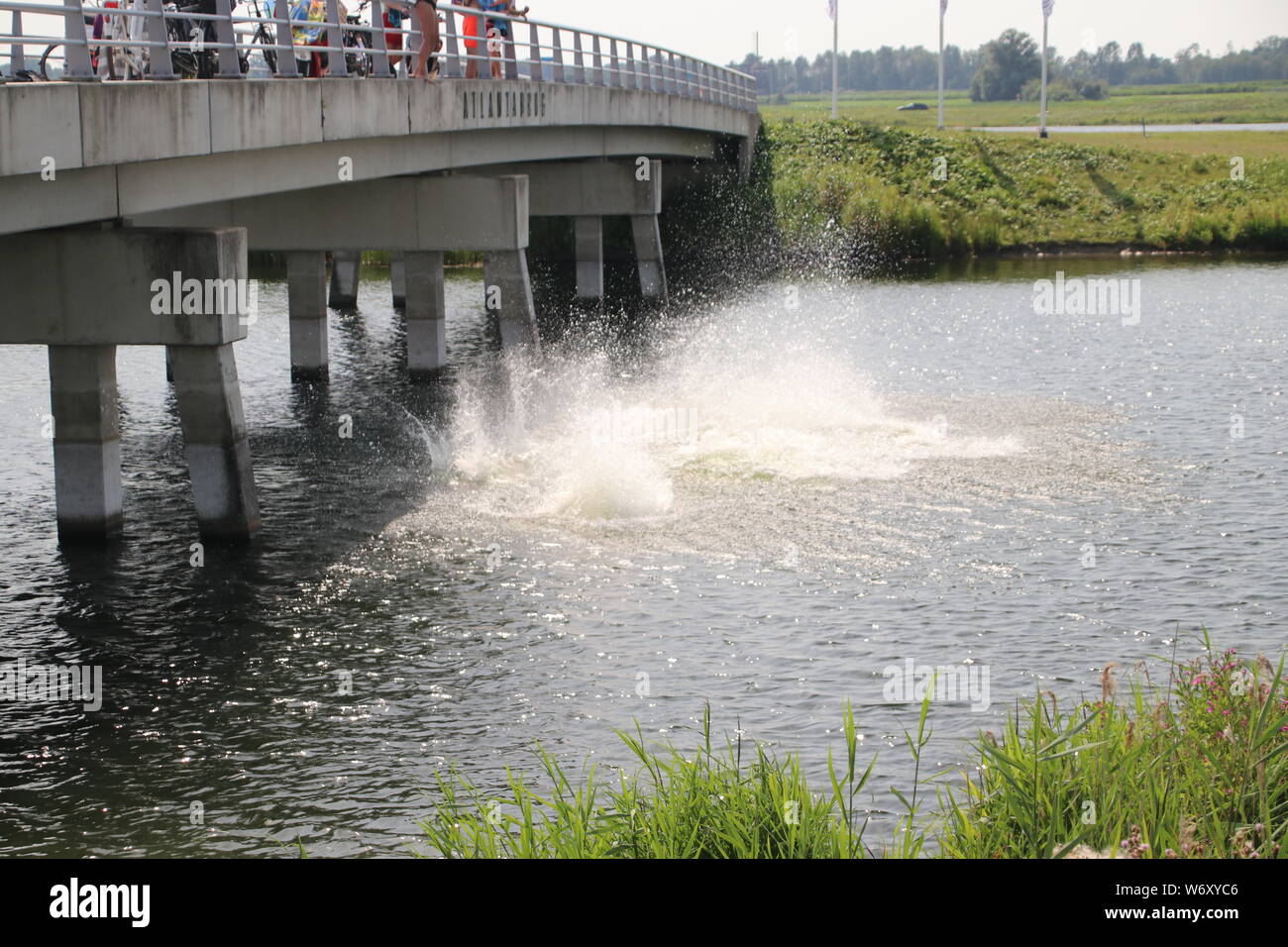 Children jumping in to a river hi-res stock photography and images - Alamy